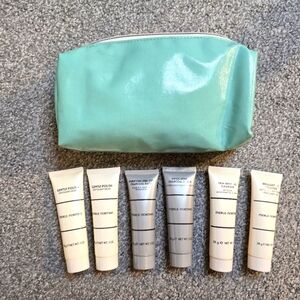 Merle Norman Teal Cosmetic Bag and Six Merle Norman Samples